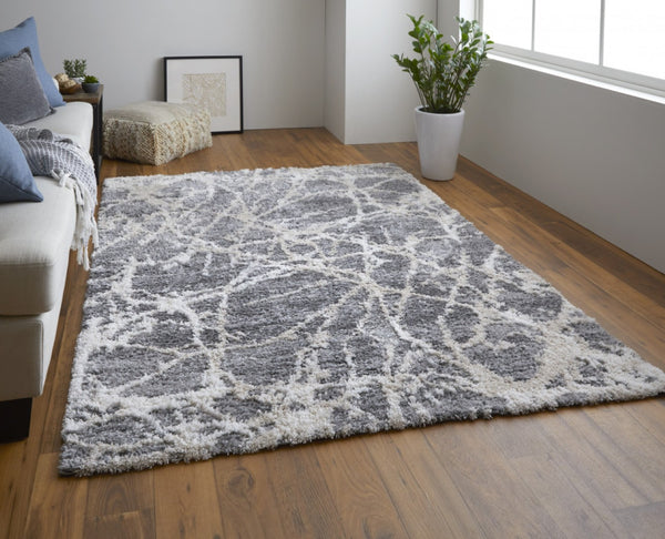 HomeRoots 4' Modern Gray and Ivory Abstract Area Rug – Stain Resistant, Durable, Perfect for High-Traffic Spaces 10' X 14' 514524