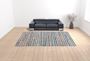 Homeroots 10' X 14' Ivory Blue And Orange Striped Power Loom Stain Resistant Area Rug  Polyester 514531