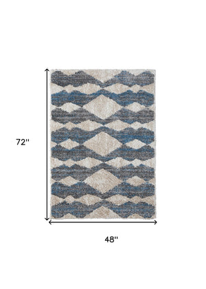 Homeroots 4' X 6' Ivory Gray And Blue Chevron Power Loom Stain Resistant Area Rug Ivory,Gray,Blue Polyester 514534