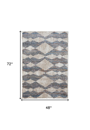 Homeroots 4' X 6' Tan Ivory And Blue Chevron Power Loom Stain Resistant Area Rug Tan,Ivory,Blue Polyester 514541