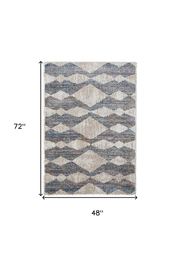 Homeroots 4' X 6' Tan Ivory And Blue Chevron Power Loom Stain Resistant Area Rug Tan,Ivory,Blue Polyester 514541