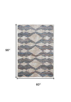 Homeroots 5' X 8' Tan Ivory And Blue Chevron Power Loom Stain Resistant Area Rug Tan,Ivory,Blue Polyester 514542