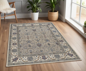 Homeroots 4' X 6' Ivory And Blue Wool Floral Hand Tufted Area Rug  Wool 514810