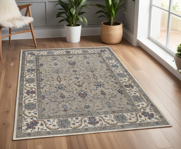 Homeroots 4' X 6' Ivory And Blue Wool Floral Hand Tufted Area Rug  Wool 514810