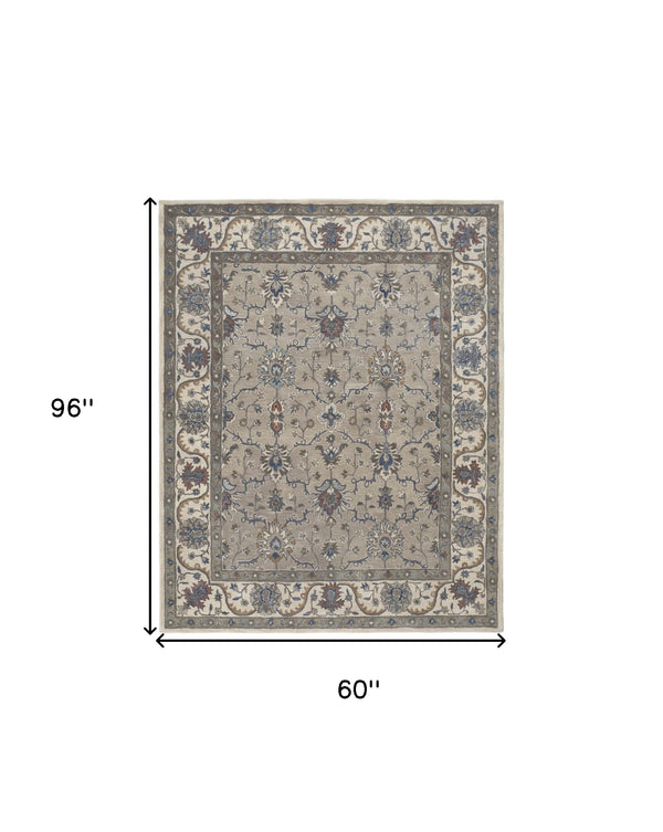Homeroots 5' X 8' Ivory And Blue Wool Floral Hand Tufted Area Rug  Wool 514811