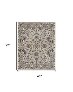 HomeRoots 4' Hand-Tufted Wool Area Rug in Ivory and Blue Floral Design – Durable, Stylish, and Easy to Maintain 4' X 6' 514822