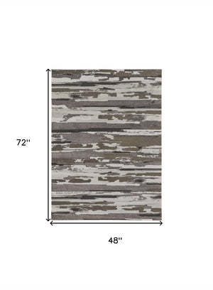 HomeRoots 4' Abstract Distressed Area Rug in Gray, Ivory & Brown - Durable, Family-Friendly Design for Homes 4' X 6' 514907