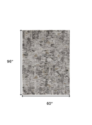Homeroots 5' X 8' Gray And Ivory Abstract Power Loom Distressed Area Rug Ivory,Gray,Brown Polypropylene 514932