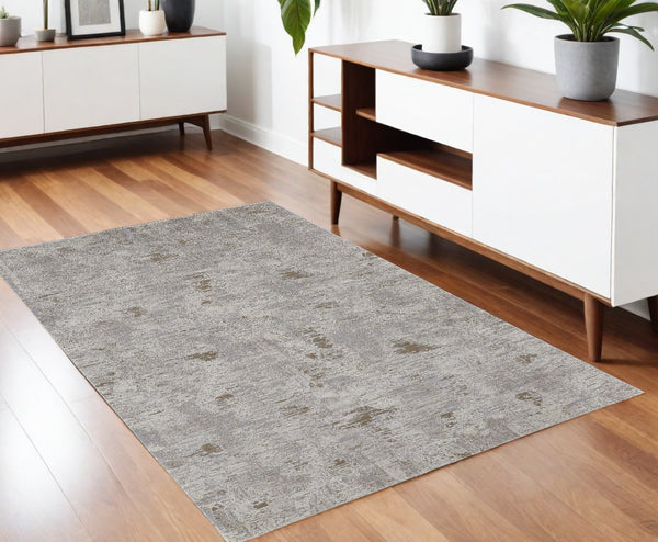 Homeroots 4' X 6' Gray And Ivory Abstract Power Loom Distressed Area Rug Ivory,Gray,Tan Polypropylene 514939