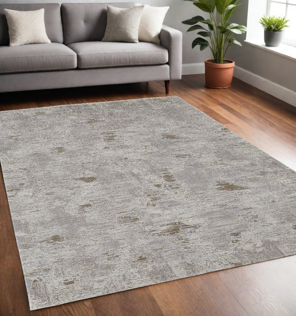 Homeroots 5' X 8' Gray And Ivory Abstract Power Loom Distressed Area Rug Ivory,Gray,Tan Polypropylene 514940