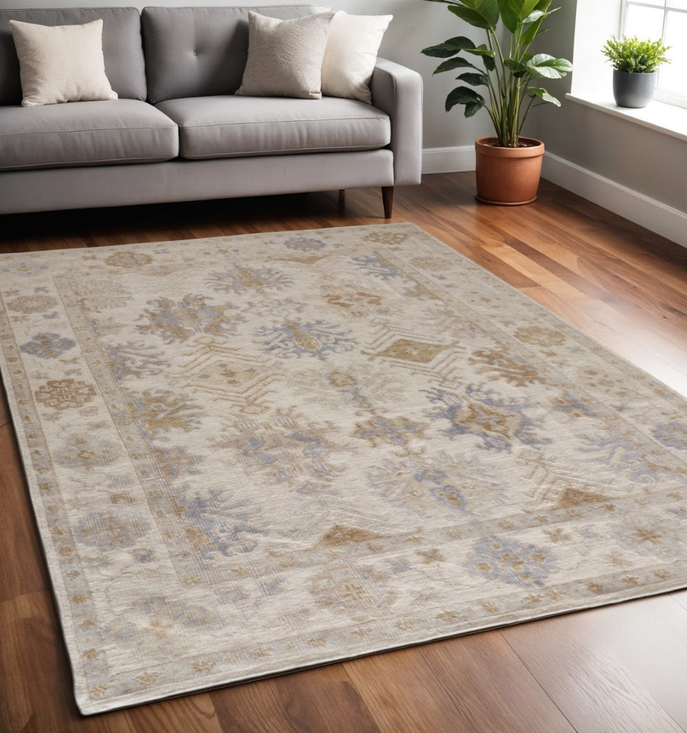 HomeRoots 4' Hand-Knotted Floral Area Rug in Ivory, Tan & Blue - Eco-Friendly, Stain-Resistant Elegance 5' X 8' 514964