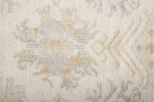 Homeroots 8' X 10' Ivory Tan And Blue Floral Hand Knotted Stain Resistant Area Rug  Other Material 514965