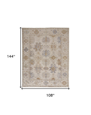 Homeroots 9' X 12' Ivory Tan And Blue Floral Hand Knotted Stain Resistant Area Rug  Other Material 514966