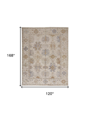 Homeroots 10' X 14' Ivory Tan And Blue Floral Hand Knotted Stain Resistant Area Rug  Other Material 514967