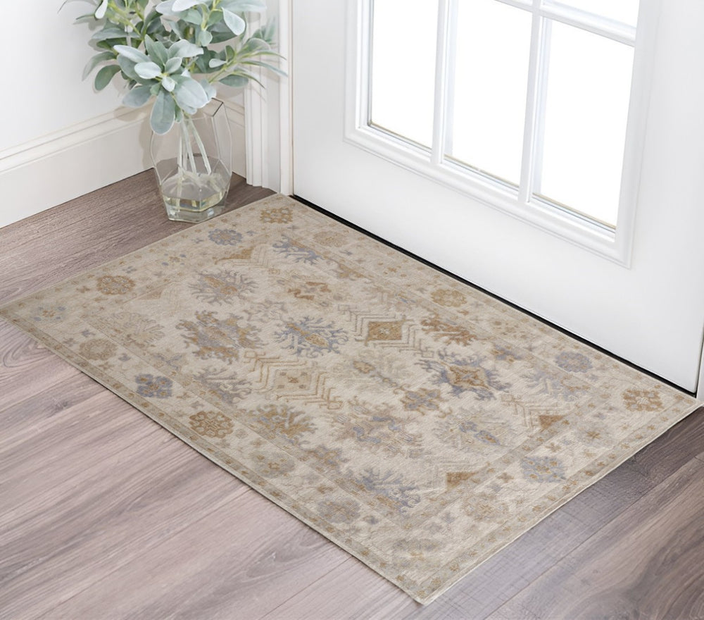 HomeRoots 2' Floral Hand-Knotted Area Rug in Ivory, Tan, and Blue – Eco-Friendly, Stain-Resistant Design 2' X 3' 514969