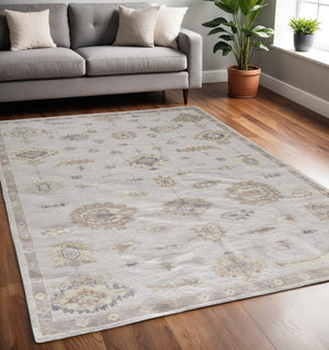 HomeRoots 4' Hand-Knotted Orange and Ivory Floral Area Rug - Unique Artisan Craftsmanship for Stylish Spaces 5' X 8' 514971