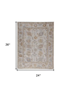 HomeRoots 2' Handmade Distressed Medallion Area Rug in Soft Ivory and Tan for Indoor or Outdoor Use 2' x 3' 514983