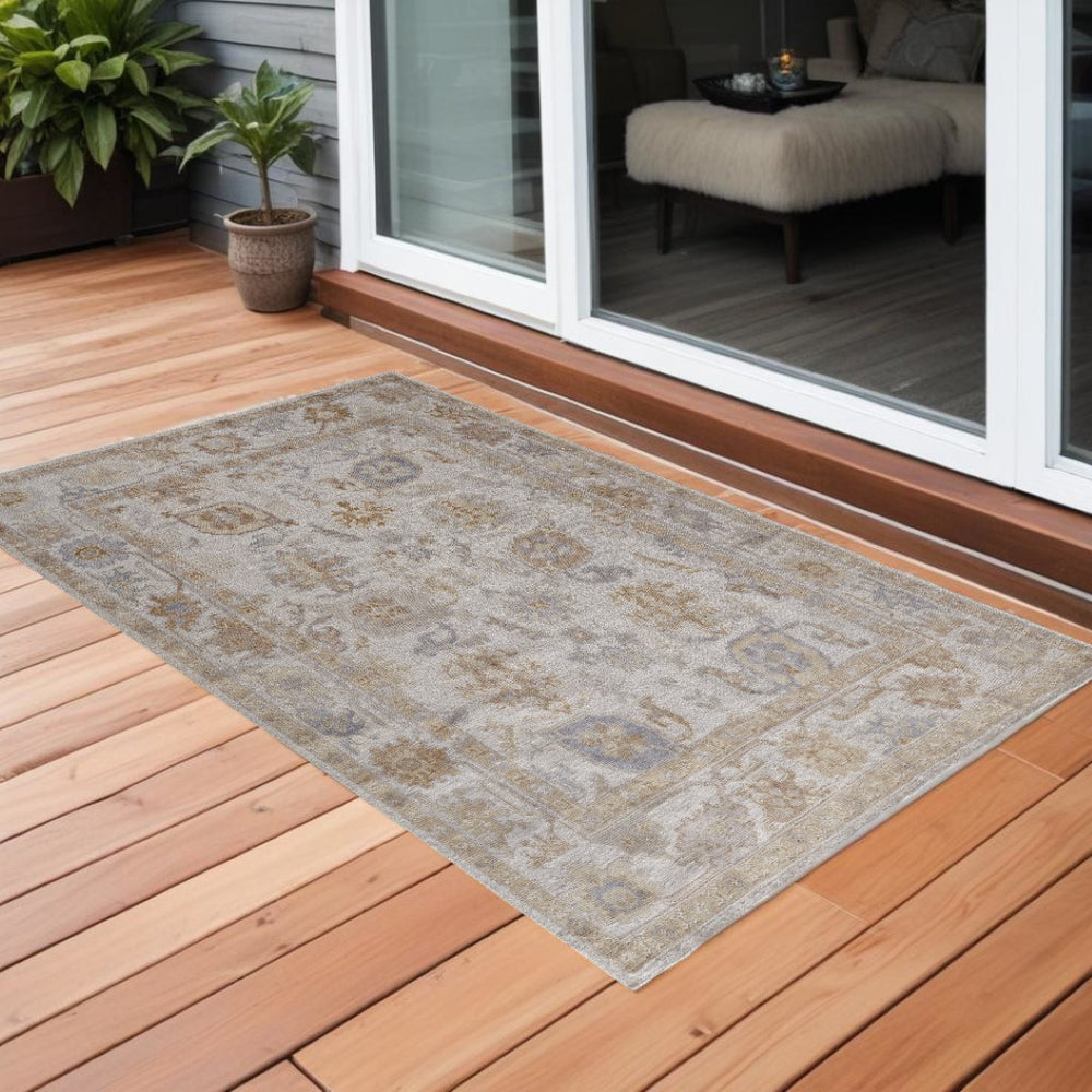 HomeRoots 2' Handmade Distressed Medallion Area Rug in Soft Ivory and Tan for Indoor or Outdoor Use 2' x 3' 514983