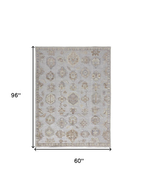HomeRoots 4' Hand-Knotted Gray and Ivory Floral Area Rug - Timeless Elegance with Stain-Resistant Durability 5' X 8' 514985