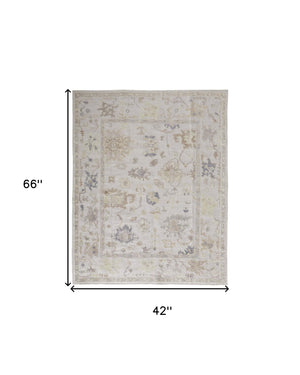 Homeroots 4' X 6' Tan Ivory And Orange Floral Hand Knotted Stain Resistant Area Rug  Other Material 515005