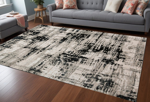 HomeRoots 9' Modern Black Gray and White Abstract Area Rug - Stylish, Durable Design for Any Room Space 10' X 13' 515024