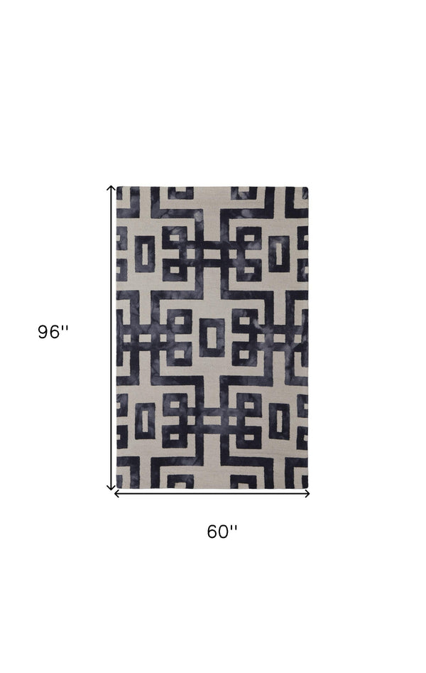 Homeroots 5' X 8' Ivory And Black Wool Tufted Handmade Area Rug  Wool 515242