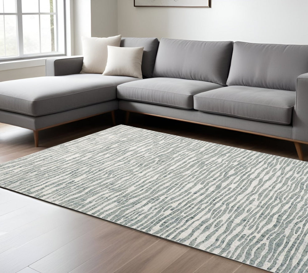 HomeRoots 10' Striped Distressed Area Rug in Gray-Green and Ivory - Stain Resistant, Elegant Home Decor Piece 8' X 10' 515321