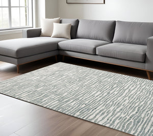 Homeroots 8' X 10' Gray And Ivory Striped Distressed Non Skid Area Rug  Polypropylene 515321