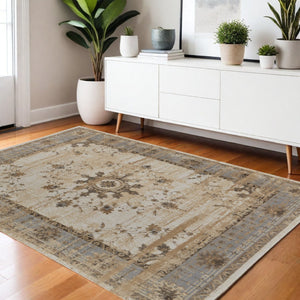 HomeRoots 9' Timeless Tan Brown and Gray Oriental Distressed Area Rug for Elegant Living Spaces and Comfort 4' X 6' 515492