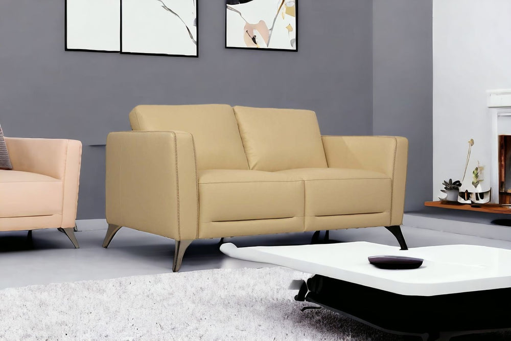 HomeRoots 59" Cream Leather Loveseat with Silver Accents - Modern Comfort for Stylish Living Spaces & Offices 515678