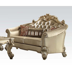 HomeRoots 67" Bone and Gold Faux Leather Loveseat with Toss Pillows - Luxe Comfort for Stylish Living Spaces 515704