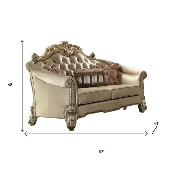HomeRoots 67" Bone and Gold Faux Leather Loveseat with Toss Pillows - Luxe Comfort for Stylish Living Spaces 515704