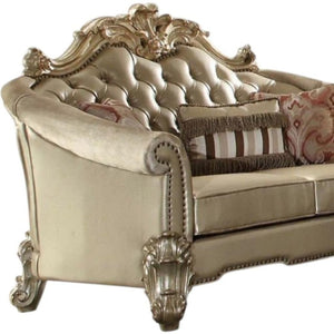 HomeRoots 67" Bone and Gold Faux Leather Loveseat with Toss Pillows - Luxe Comfort for Stylish Living Spaces 515704