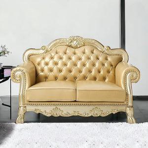 HomeRoots 64" Bone Faux Leather Loveseat with Gold Trim, Toss Pillows & Elegant Button Tufting for Comfort 515706