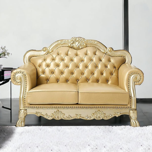 HomeRoots 64" Bone Faux Leather Loveseat with Gold Trim, Toss Pillows & Elegant Button Tufting for Comfort 515706