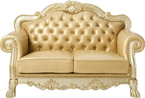 HomeRoots 64" Bone Faux Leather Loveseat with Gold Trim, Toss Pillows & Elegant Button Tufting for Comfort 515706