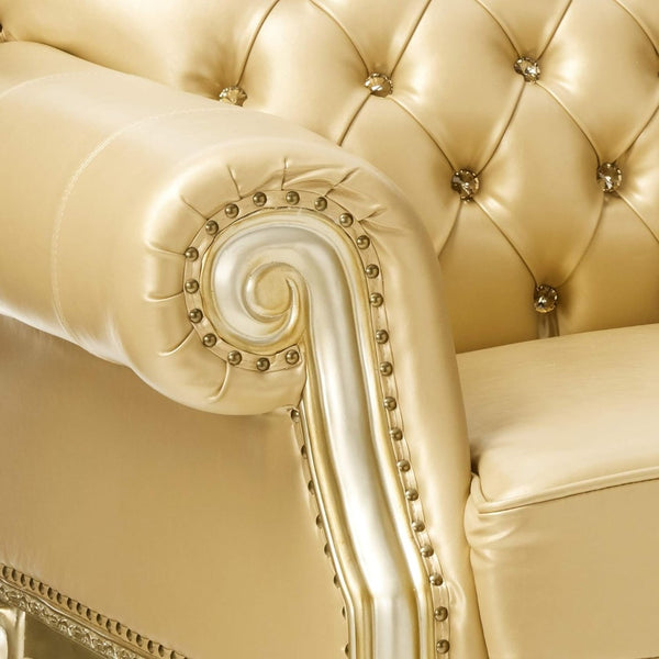 HomeRoots 64" Bone Faux Leather Loveseat with Gold Trim, Toss Pillows & Elegant Button Tufting for Comfort 515706