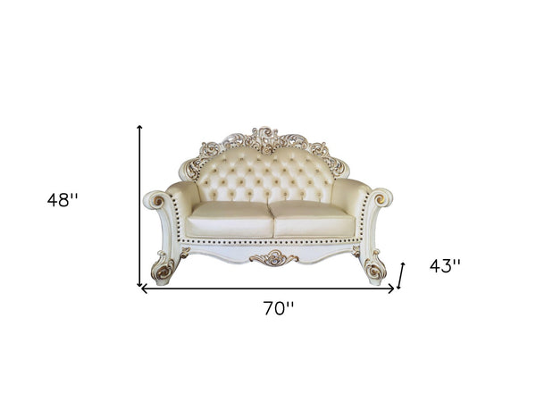 HomeRoots 70" Champagne and Pearl Faux Leather Loveseat with Toss Pillows - Elegant Comfort for Any Space 515713