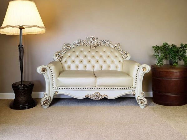 HomeRoots 70" Champagne and Pearl Faux Leather Loveseat with Toss Pillows - Elegant Comfort for Any Space 515713