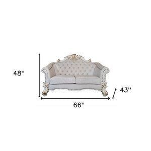 HomeRoots 66" Elegant Two-Tone Ivory & Pearl Velvet Loveseat with Toss Pillows for Luxurious Living Spaces 515714