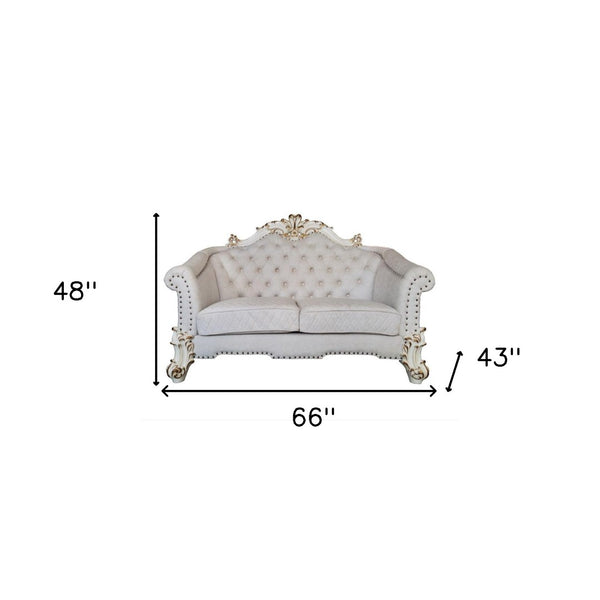 HomeRoots 66" Elegant Two-Tone Ivory & Pearl Velvet Loveseat with Toss Pillows for Luxurious Living Spaces 515714