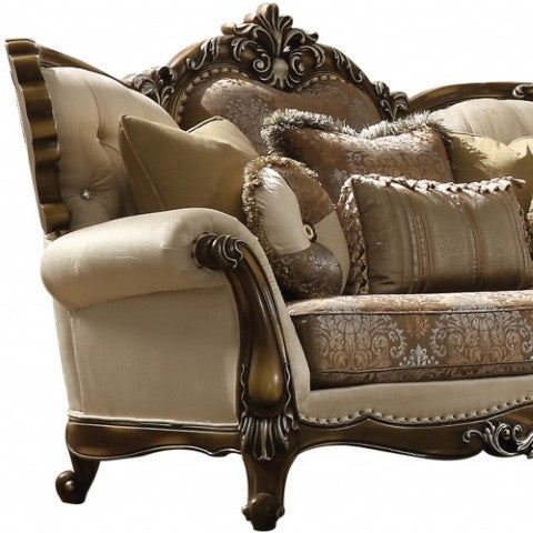 Homeroots 74" Elegant Tan And Brown Velvet Damask Curved Loveseat With Reversible Toss Pillows For Comfort   515717