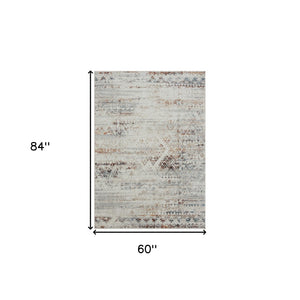 Homeroots 5' X 7' Ivory Tribal Distressed Washable Area Rug  Polyester 515813