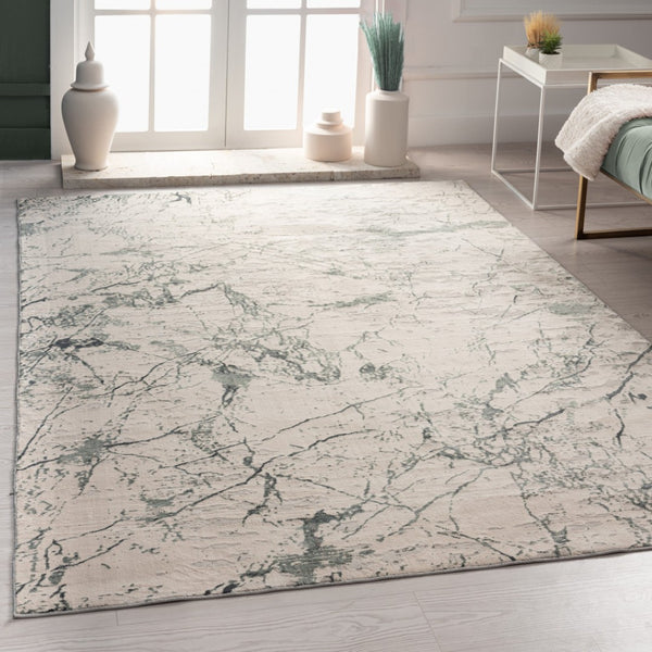 HomeRoots 5' Ivory Abstract Area Rug - Luxurious High-Low Texture for Modern Spaces, Crafted in Turkey for Quality 5' X 8' 516005