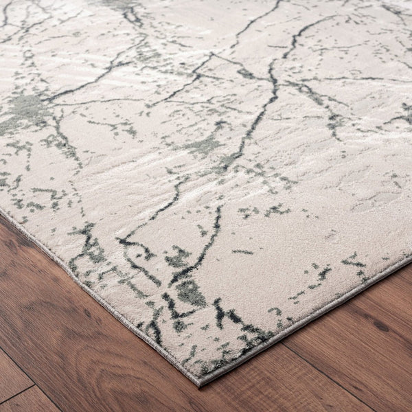 HomeRoots 5' Ivory Abstract Area Rug - Luxurious High-Low Texture for Modern Spaces, Crafted in Turkey for Quality 5' X 8' 516005