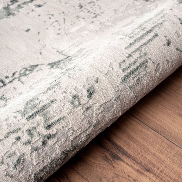 HomeRoots 5' Ivory Abstract Area Rug - Luxurious High-Low Texture for Modern Spaces, Crafted in Turkey for Quality 5' X 8' 516005