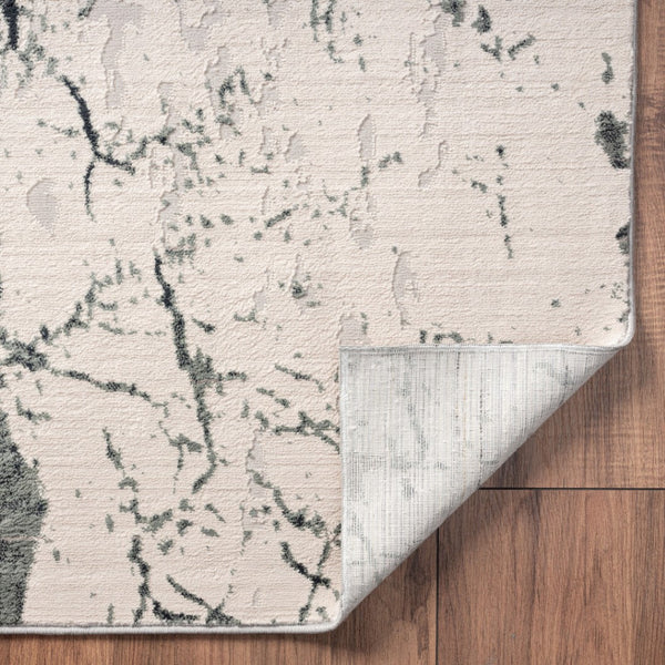 HomeRoots 5' Ivory Abstract Area Rug - Luxurious High-Low Texture for Modern Spaces, Crafted in Turkey for Quality 5' X 8' 516005