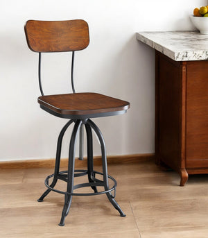 Homeroots Chestnut And Black Solid Wood And Steel Adjustable Height Swivel Bar Chair   516122