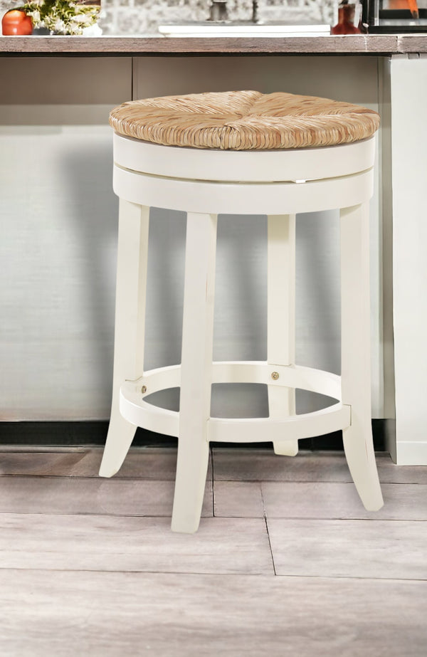 Homeroots 24" Natural And Antiqued White Solid Wood Swivel Backless Counter Height Bar Chair   516131