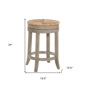 HomeRoots 24" Natural & Gray Rush Backless Swivel Bar Chair - Stylish Solid Wood Design for Modern Spaces 516132